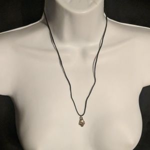 Vintage corded skull charm necklace
